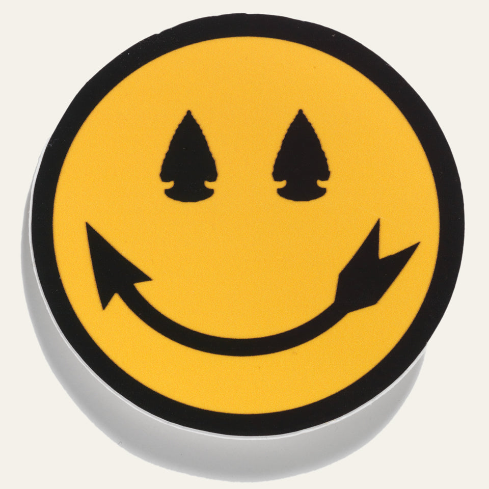 Native American designed smiley face sticker with arrowhead eyes and smile. Designed by Steven Paul Judd.