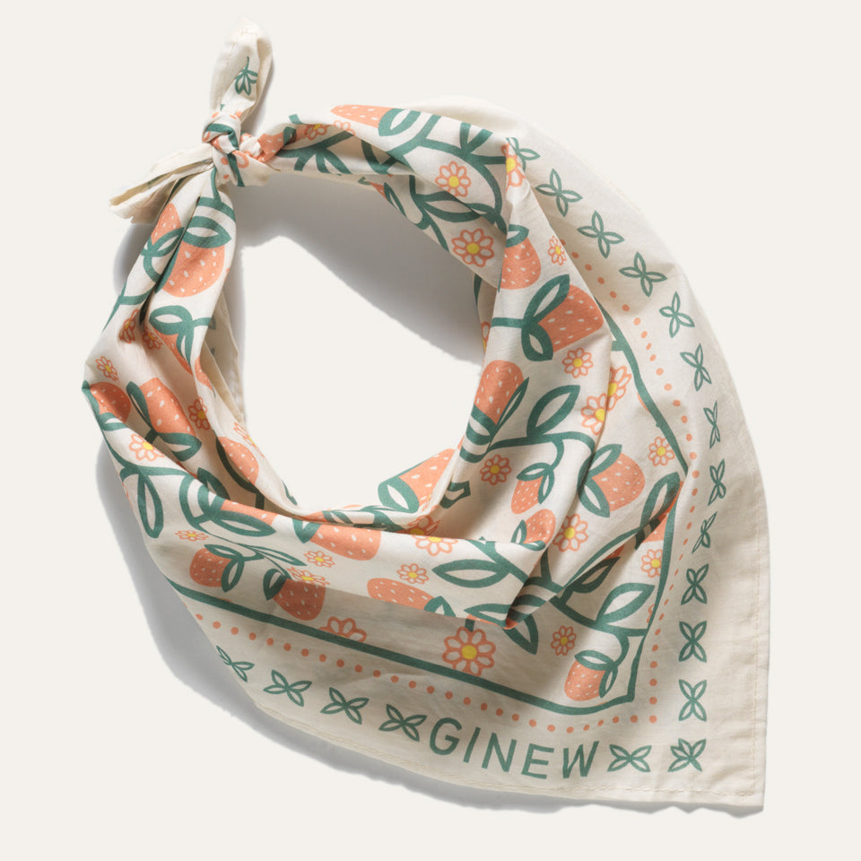 Styling option for Oneida strawberry bandana  in soft peach orange and green on cream cotton fabric made by Ginew