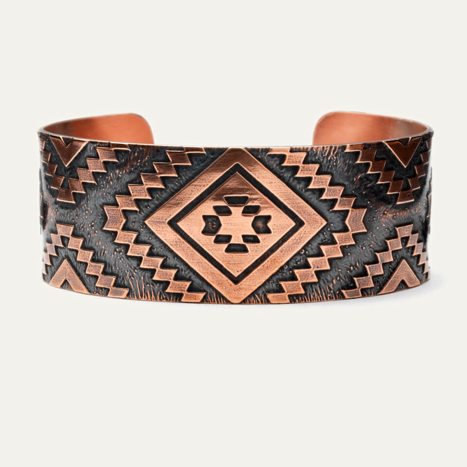 Native American made copper bracelet with diamond design. 