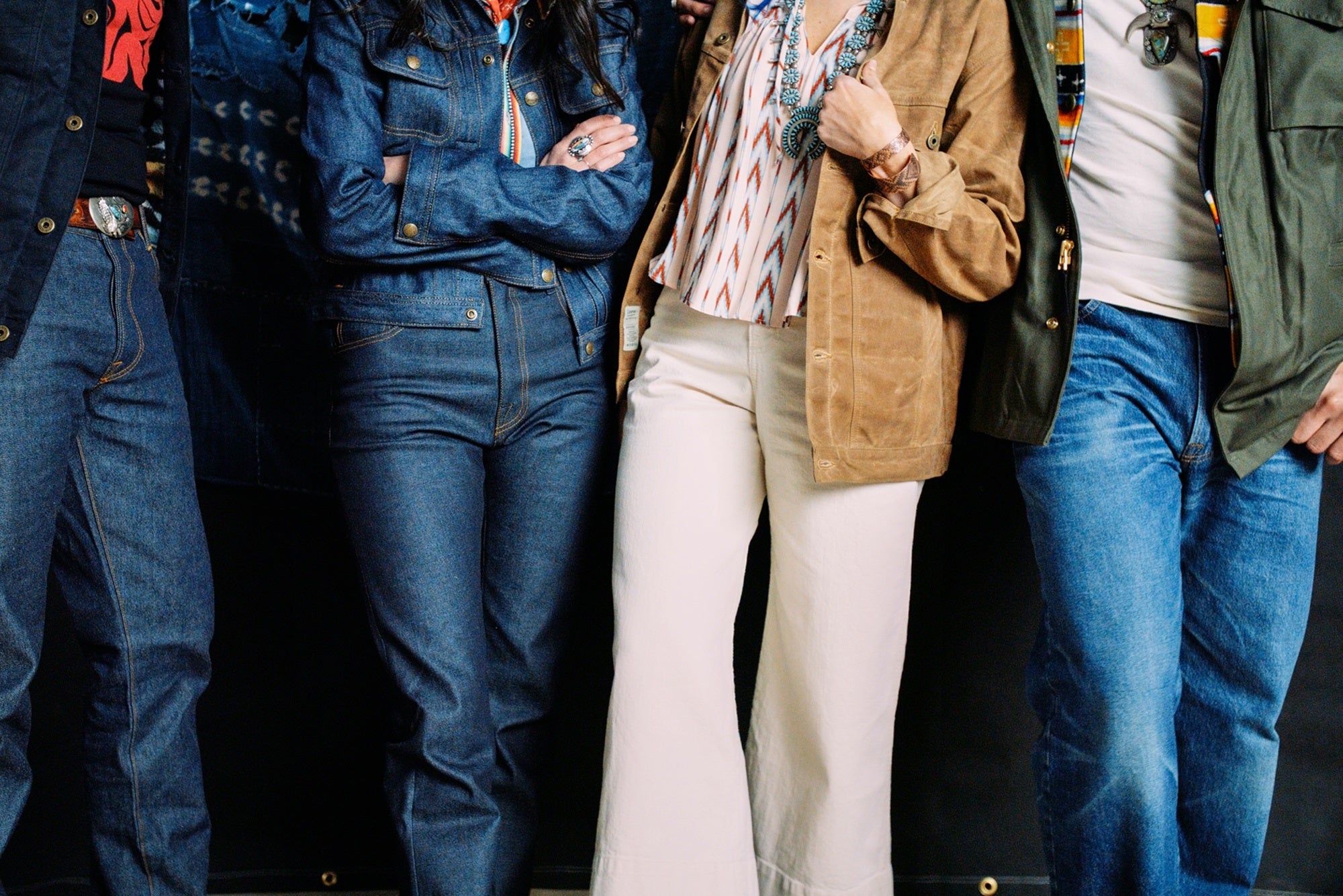Native American models wearing Ginew denim and wax canvas