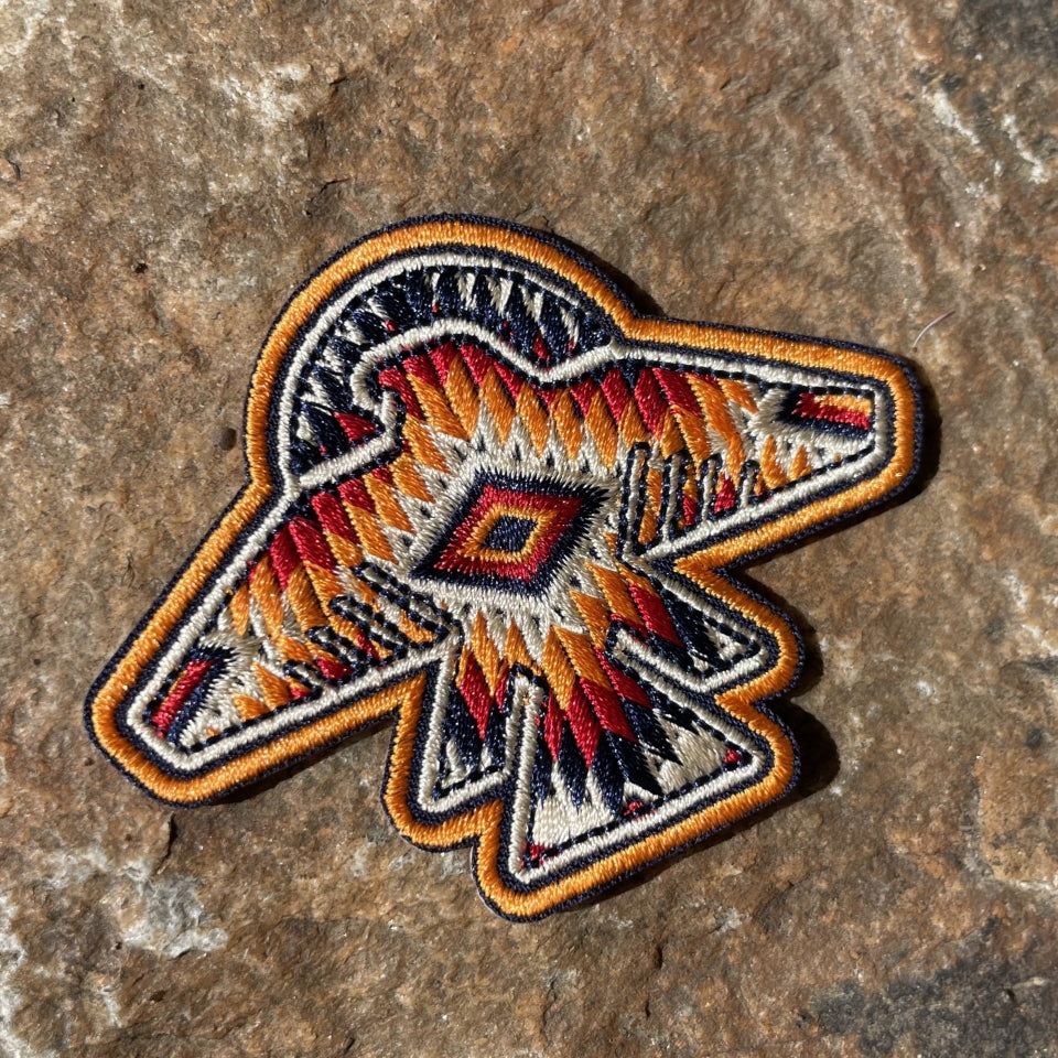 Orange, red, white Indigenous  thunderbird patch 