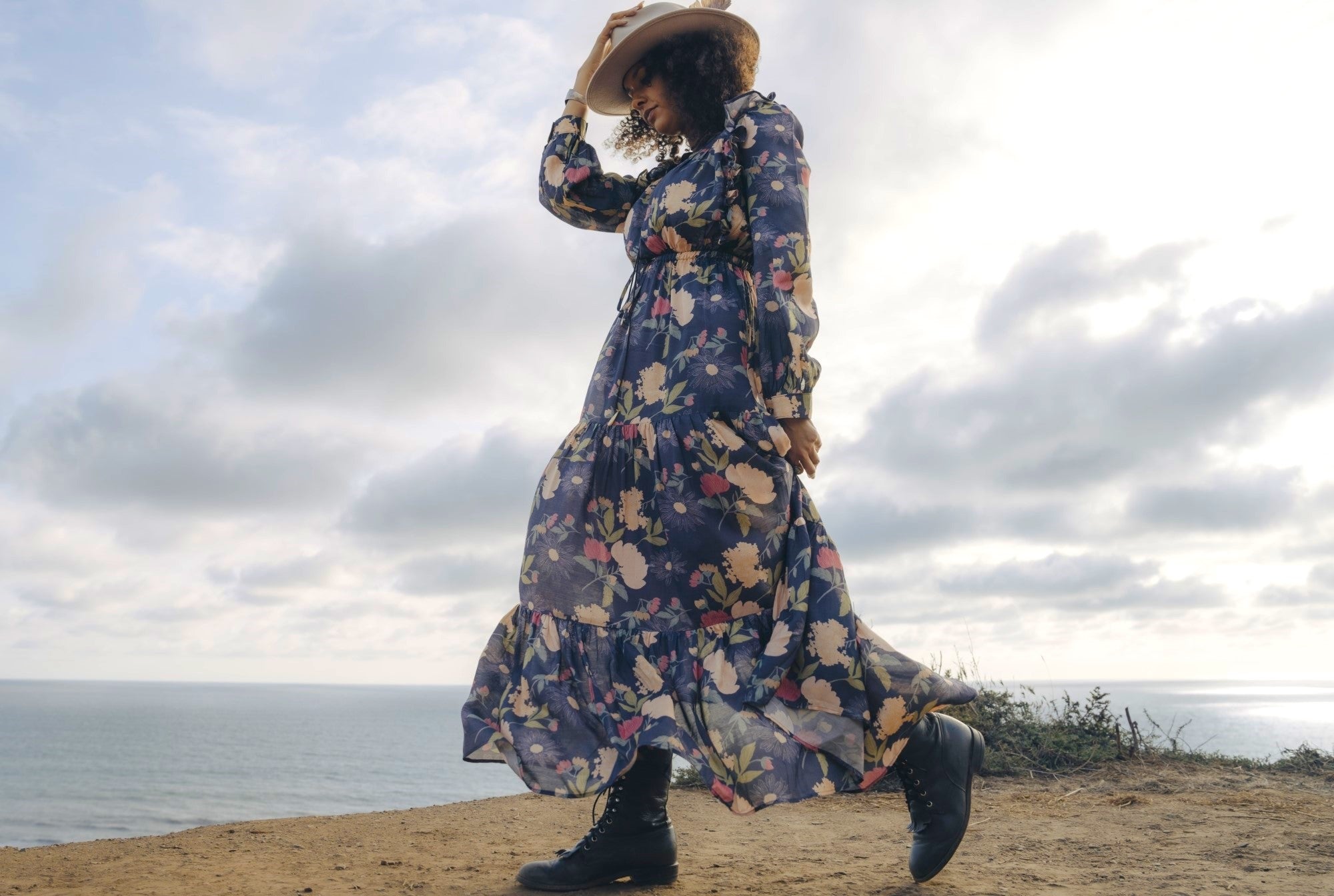 Raw silk flower dress on woman at coast