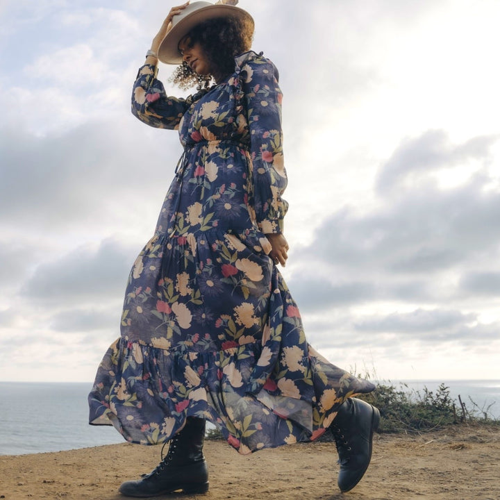 Raw silk flower dress on woman at coast 