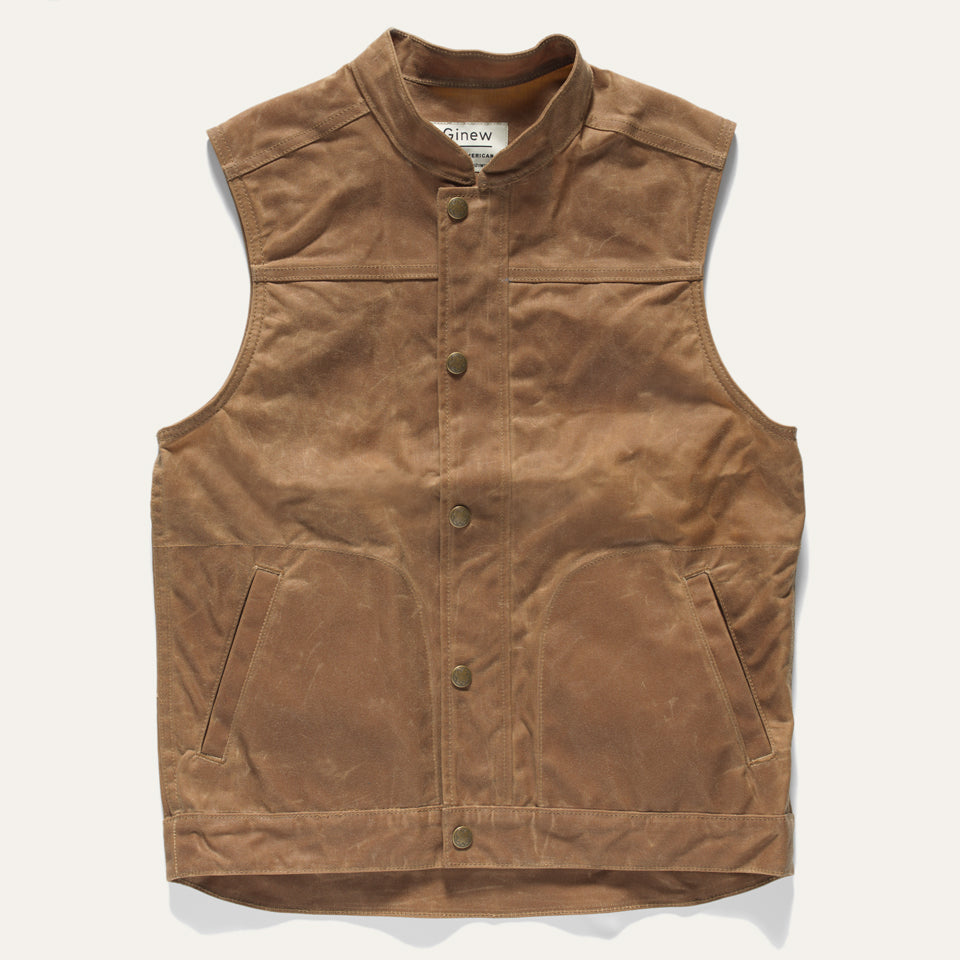 Brown wax canvas vest made in USA by Ginew, Native American-owned company.