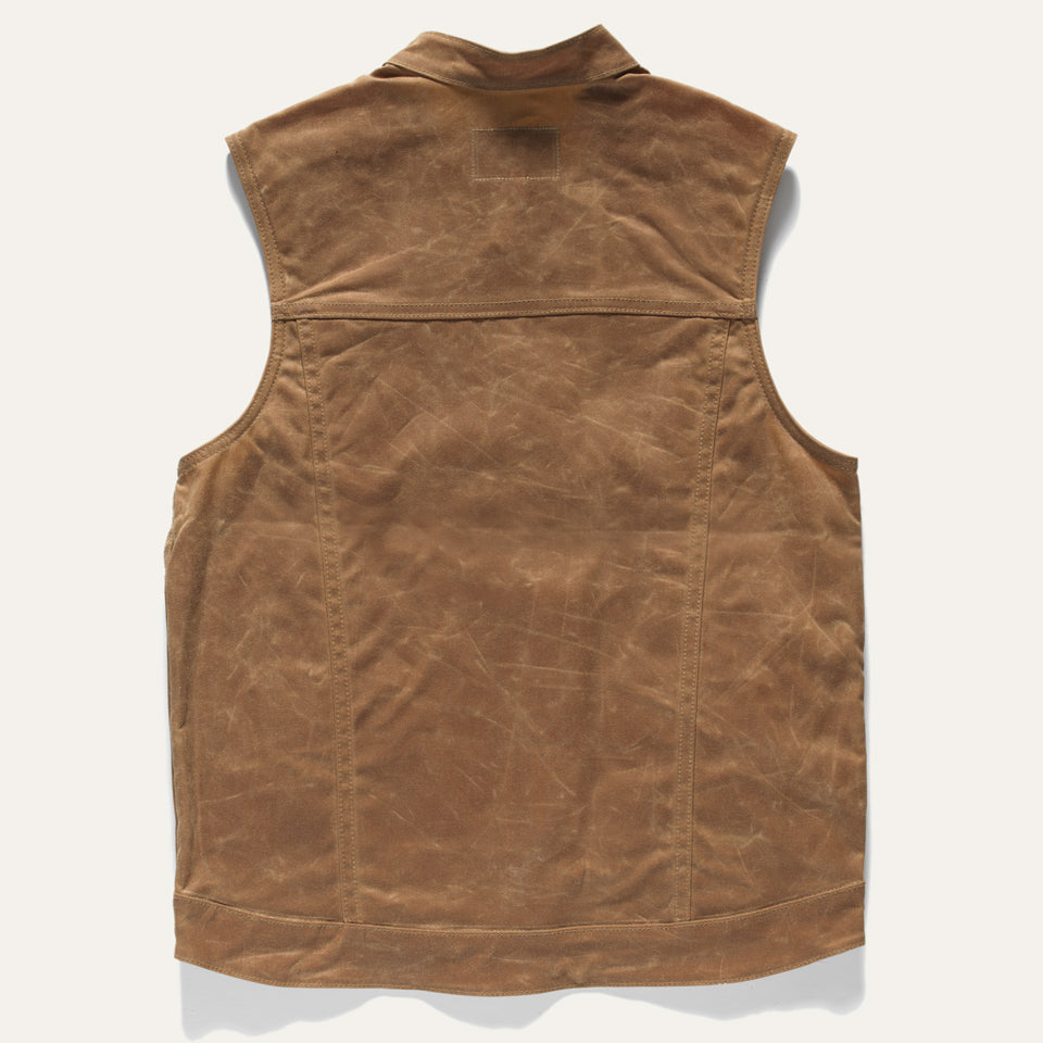 Back of brown unlined wax canvas vest by Ginew, made in USA