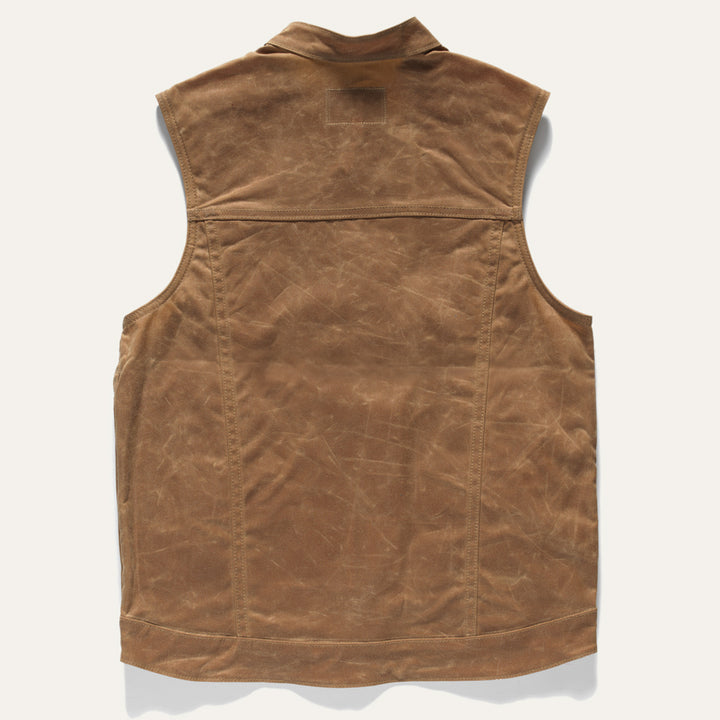 Back of brown unlined wax canvas vest by Ginew, made in USA