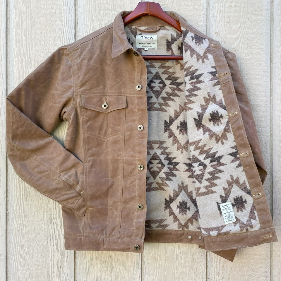 Brown wax canvas rider coat lined in Native American brown and cream wool made by Indigenous owned Ginew