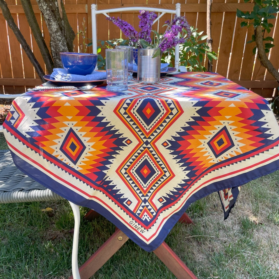 Indigenous Ginew's Blue, orange, create yellow wild rag made of cotton used as a table cloth