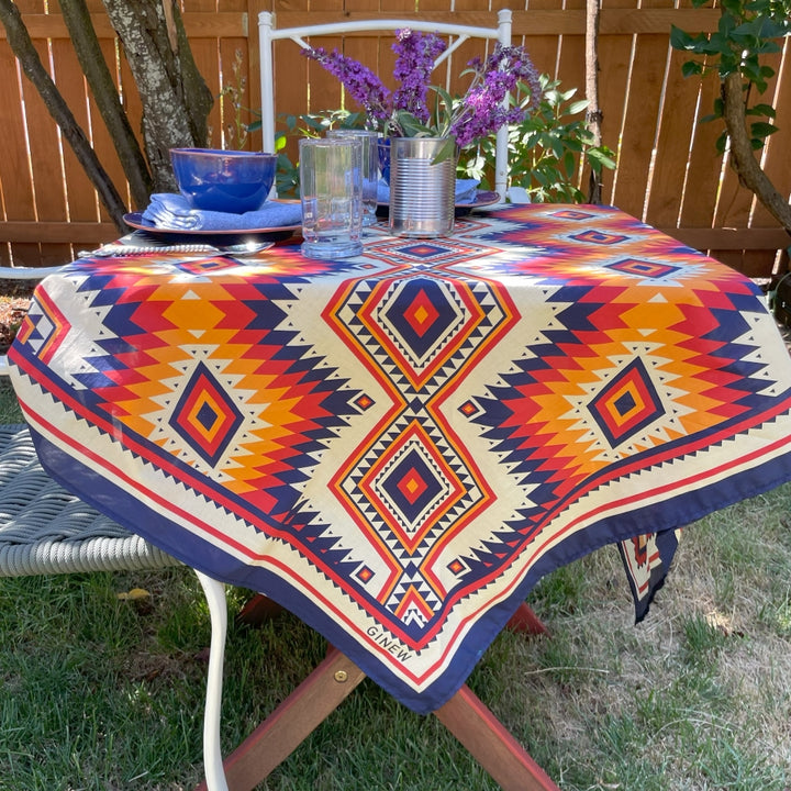 Indigenous Ginew's Blue, orange, create yellow wild rag made of cotton used as a table cloth