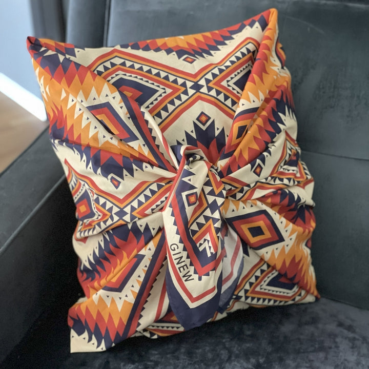 Ginew's Blue, orange, create yellow wild rag made of cotton covering a pillow 