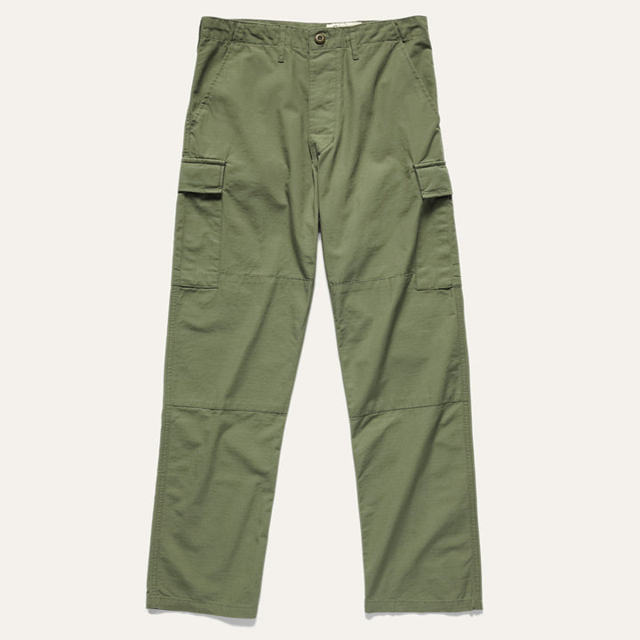 Ginew Cargo Pant with extra large side pockets in green on a neutral background.