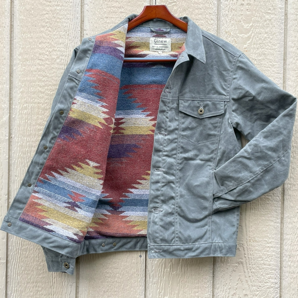 Gray silver charcoal wool lined coat with a colorful Native American patterned lining by Ginew
