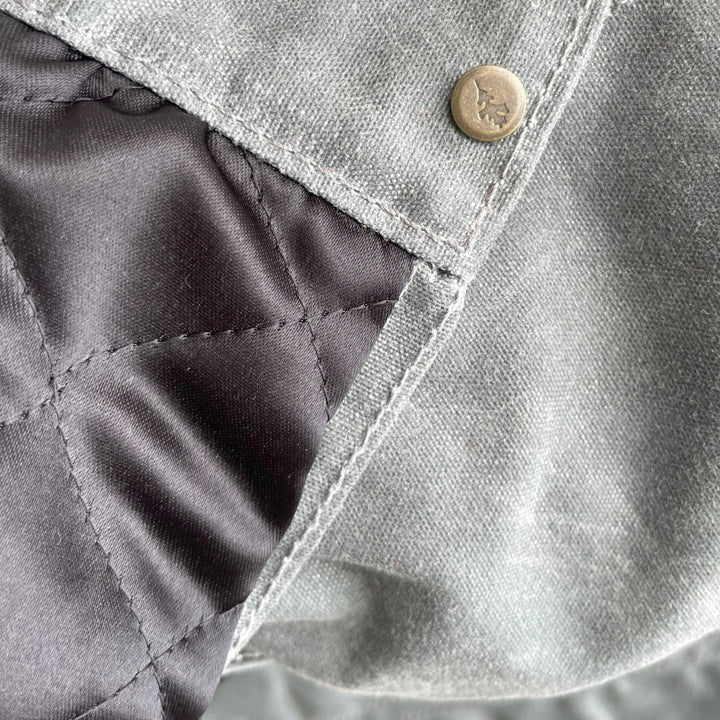 Arm quilting of ginew's Charcoal grey rider coat 