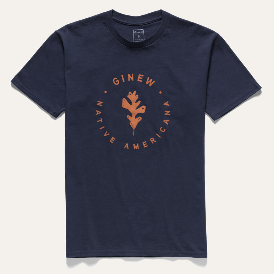 100% cotton navy tshirt made in USA with a brown oak leaf with Ginew Native Americana circle