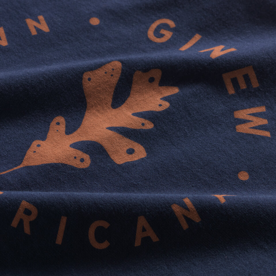 Close up of brown oak leaf on nay t-shirt made in USA