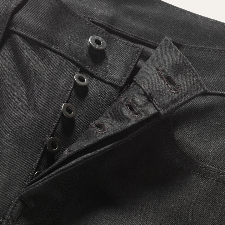 Detail view of five button fly on Black Crow Wing Selvedge denim jea