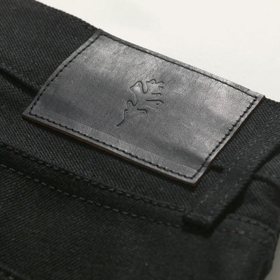 Detailed view of Deer hunted leather patch with Ginew Genesis Oak Leaf.