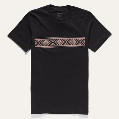 A black t-shirt is laid flat on a white background featuring a Diamond Basket graphic printed in bronze tone ink.