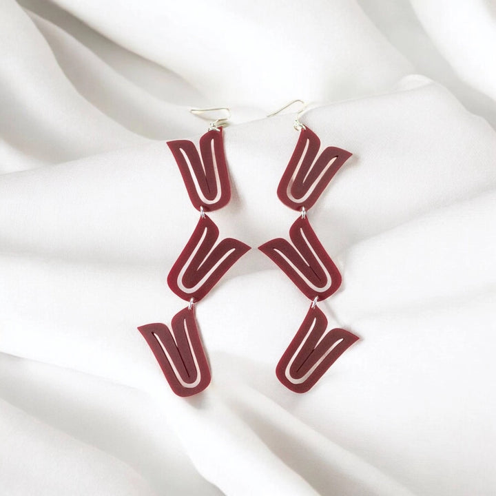 Native American made stacked earrings in maroon