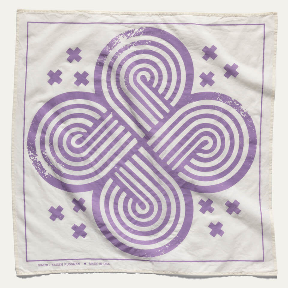 Full view of 4-Direction Bandana which is cream and features a light purple graphic of a 4-Directions knot.