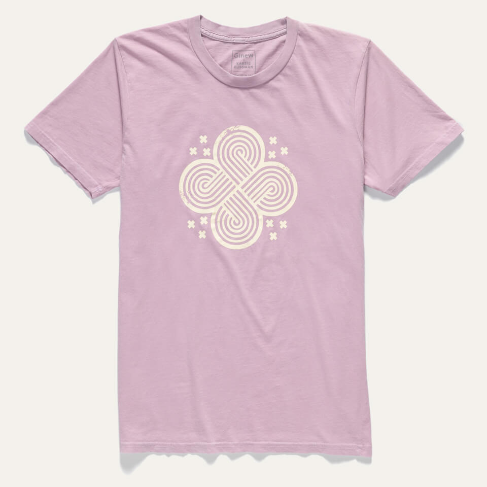 A light purple t-shirt is laid flat on a white background featuring a 4-Directions Knot graphic printed in white ink.