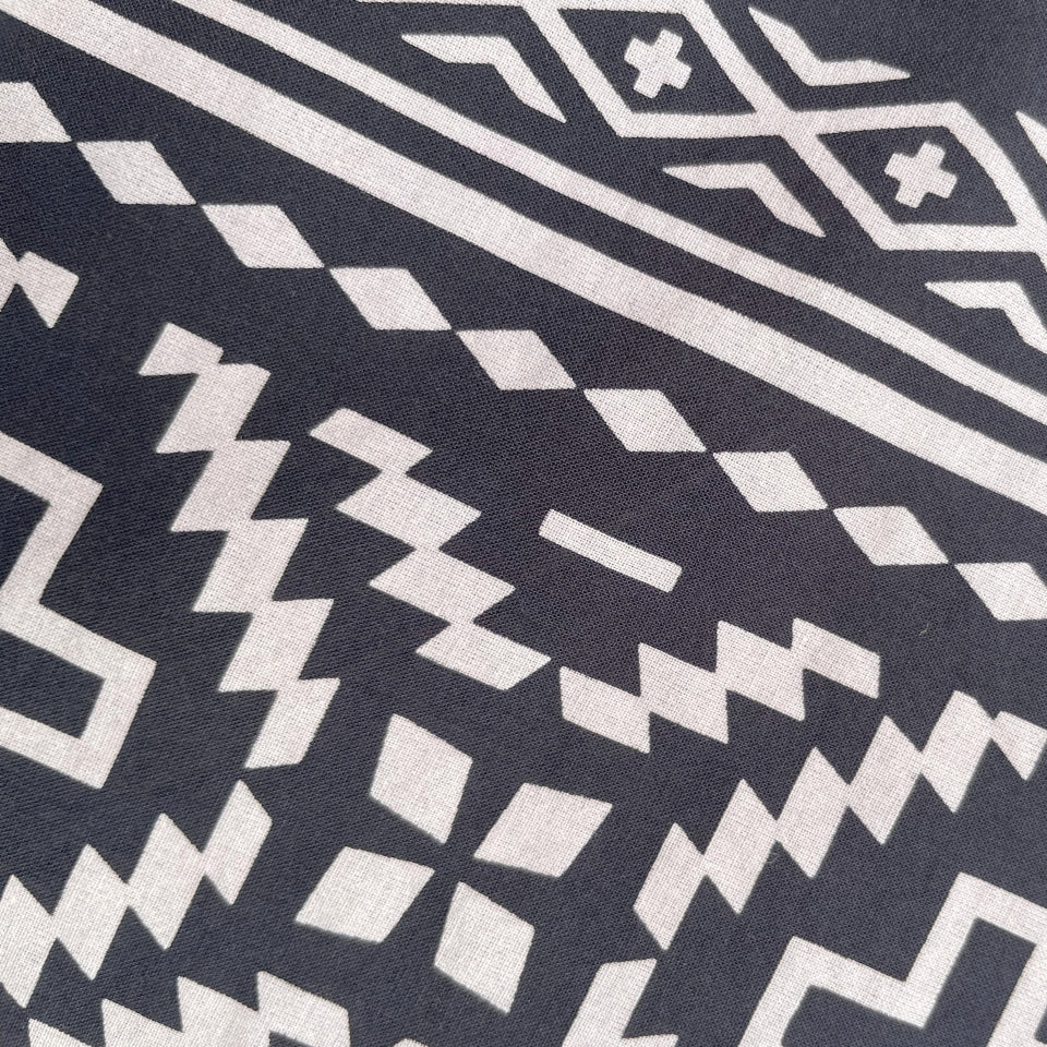 Close up of Native American Indigenous designed black and white cotton bandana by Ginew + Kassie Kussman 