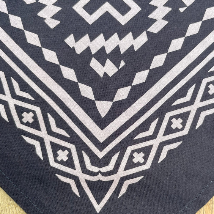 Material close up on Corner of Native American Indigenous designed black and white cotton bandana by Ginew + Kassie Kussman 