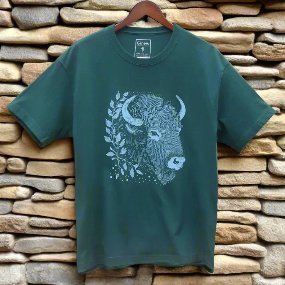 Cotton Green Bison Buffalo t-shirt made by Native American Ginew on rock wall 