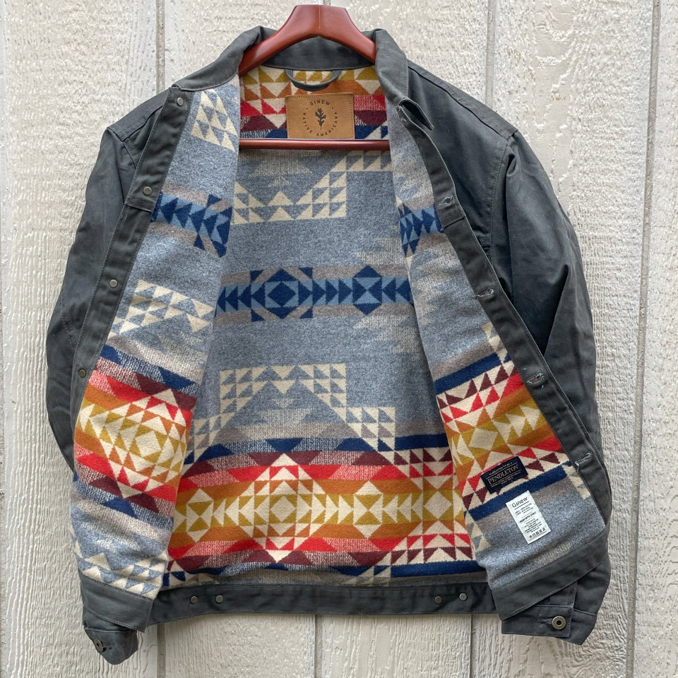 Dark green herringbone rider coat with colorful wool lining by Pendleton and made in USA by Native American, Indigenous Ginew 