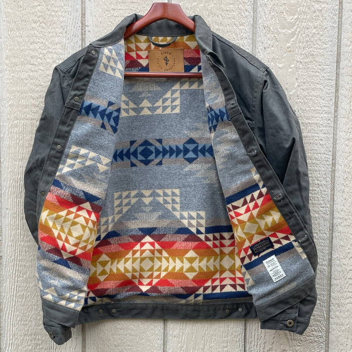 Dark green herringbone rider coat with colorful wool lining by Pendleton and made in USA by Native American, Indigenous Ginew 