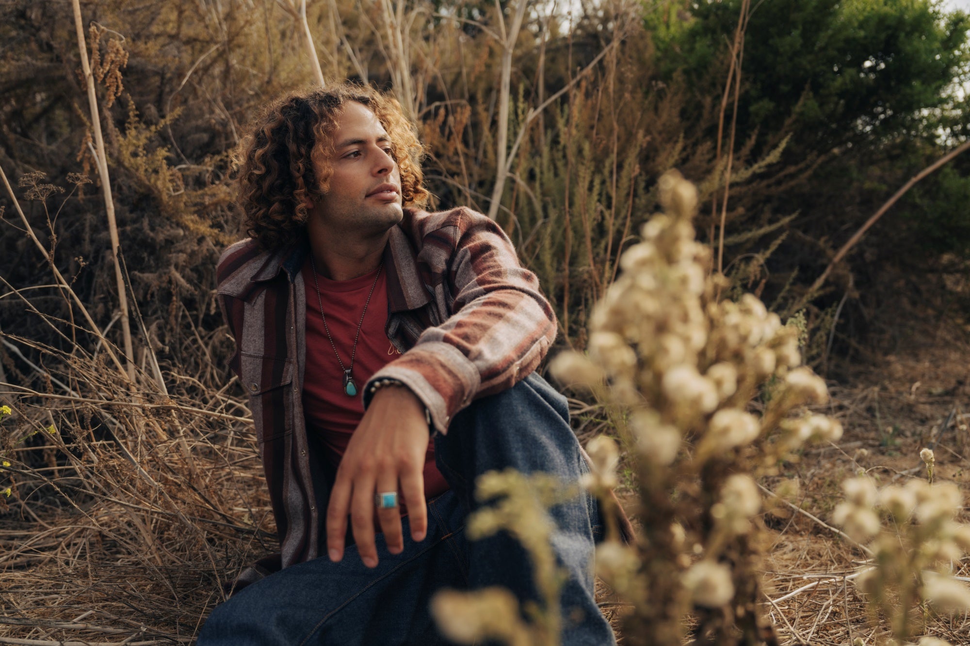 Ginew's Brown striped brushed flannel shirt on male in field 