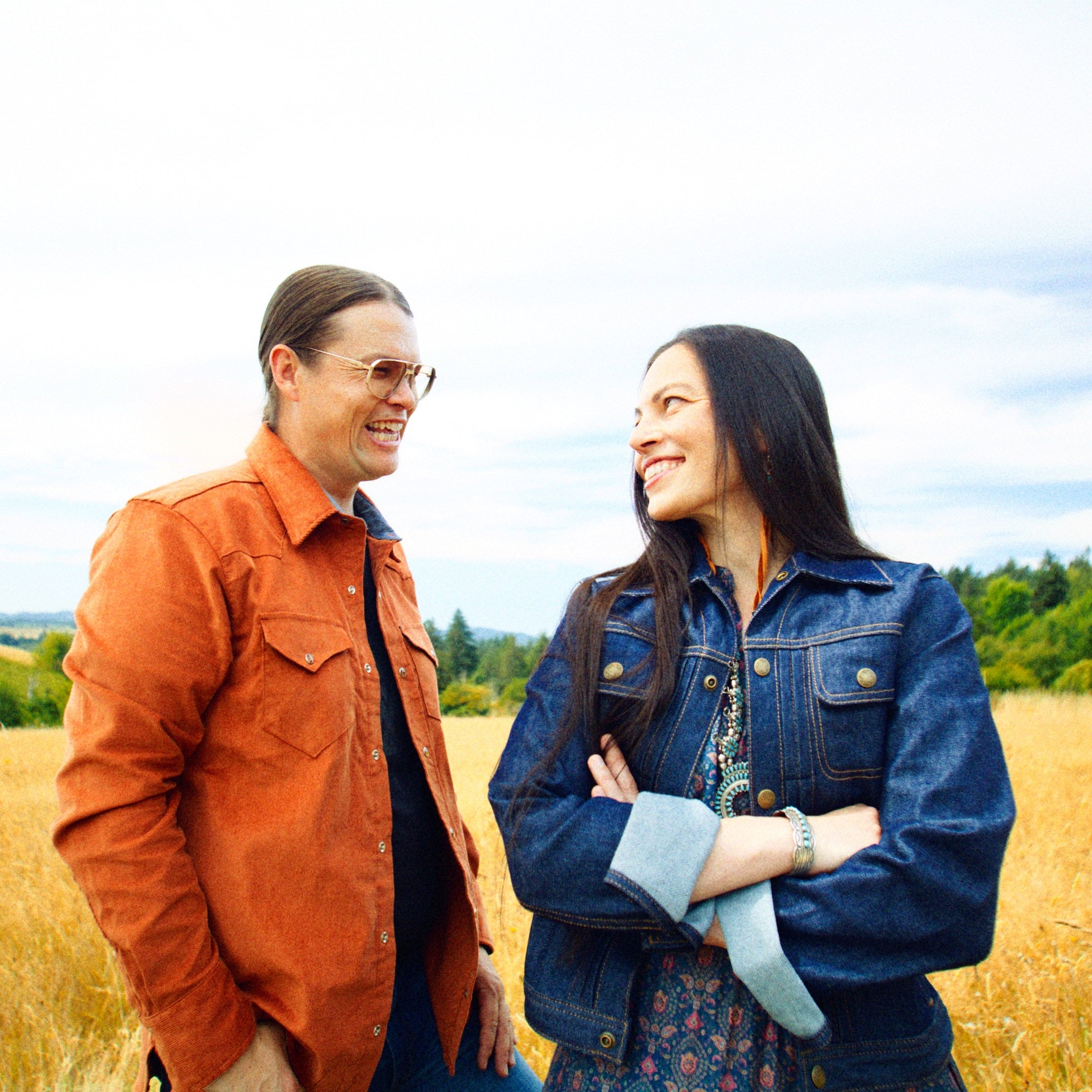Ginew Clothing company Co-founders Native American Amanda Bruegl and Erik Brodt in field