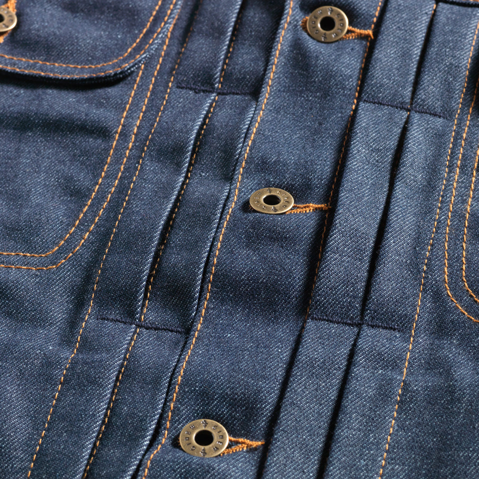 Brass hardware with Ginew's genesis leaf on Deadstock denim jacket from Ginew front view