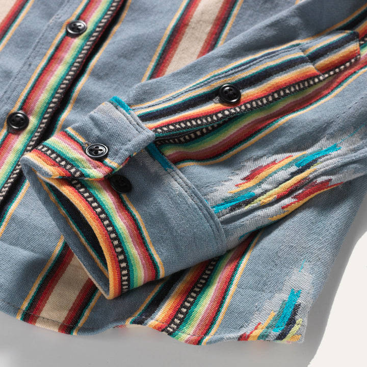 Sleeve close up on Ginew made in USA Mohican stripe shirt in gray, tan, red and green