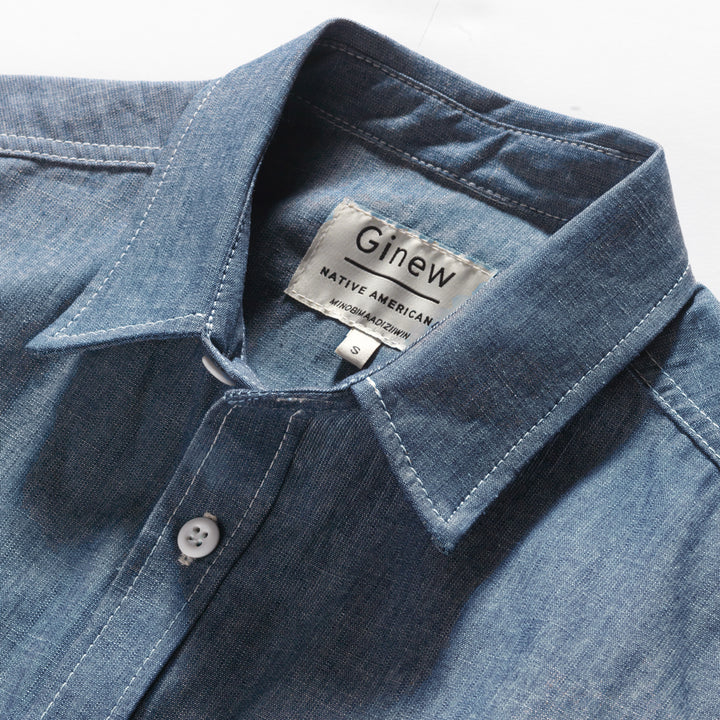 Close up of collar on Light blue cotton, 100% All cotton chambray shirt made in USA by Ginew tag.