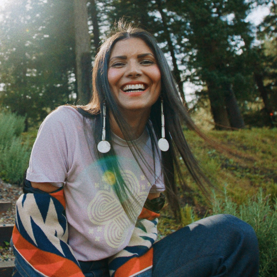 Native American Model wearing selvedge denim, wool-lined jean jacket and all-cotton tee by Ginew