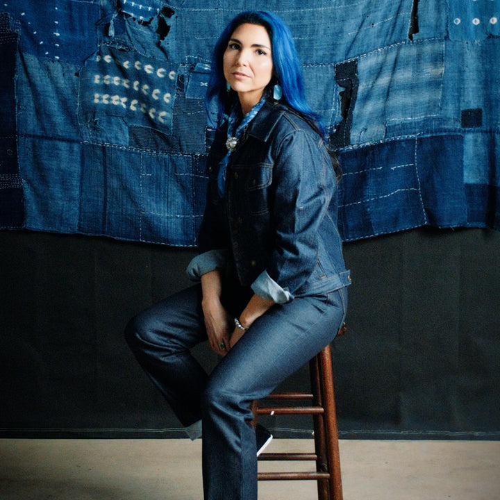 Native American model wearing denim jacket and selvedge stretch denim jeans by Ginew