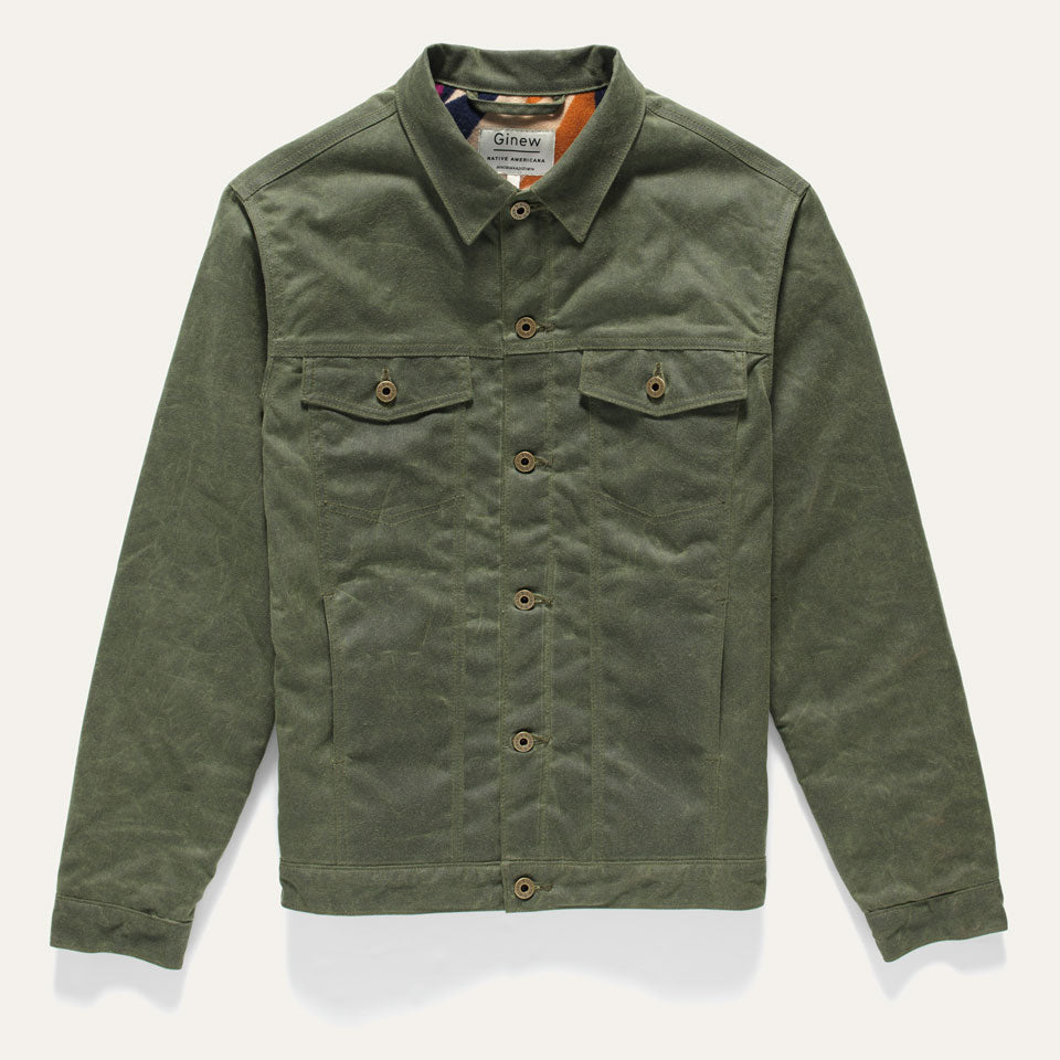 Green wax canvas coat jacket with lining made in USA by Ginew. Custom hardware.