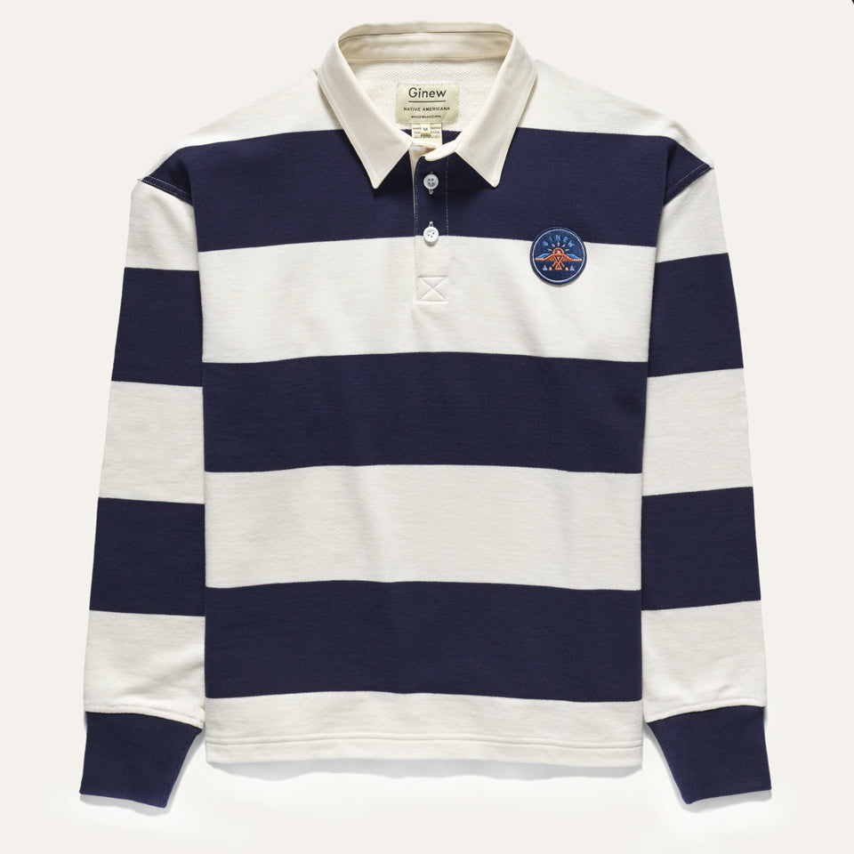 Navy and off white rugby shirt with Native American Thunderbird patch at chest 