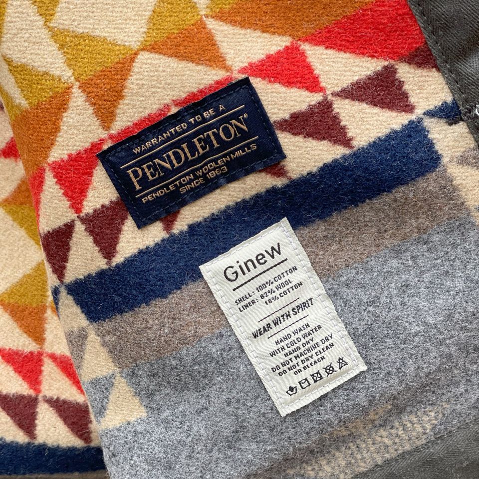 Pendleton label on a colorful fabric with 'Ginew' tag