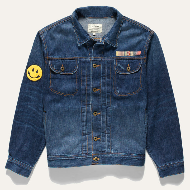 Native American designed denim jacket from Ginew + Steven Paul Judd with smiling arrow patch on right arm and color band at chest pocket