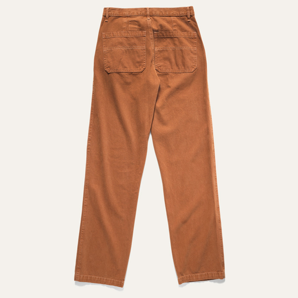 Herringbone twill pants. Full view of backside of Superior Pant in Adobe  on neutral background.
