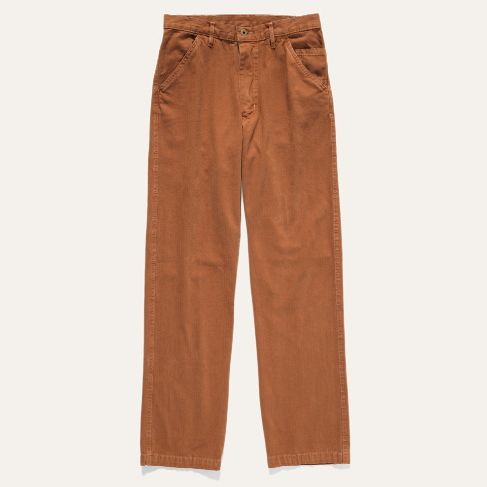 Herringbone twill pants in adobe. Superior Pant in Adobe (an earthy, warm desert brown) on a neutral background.