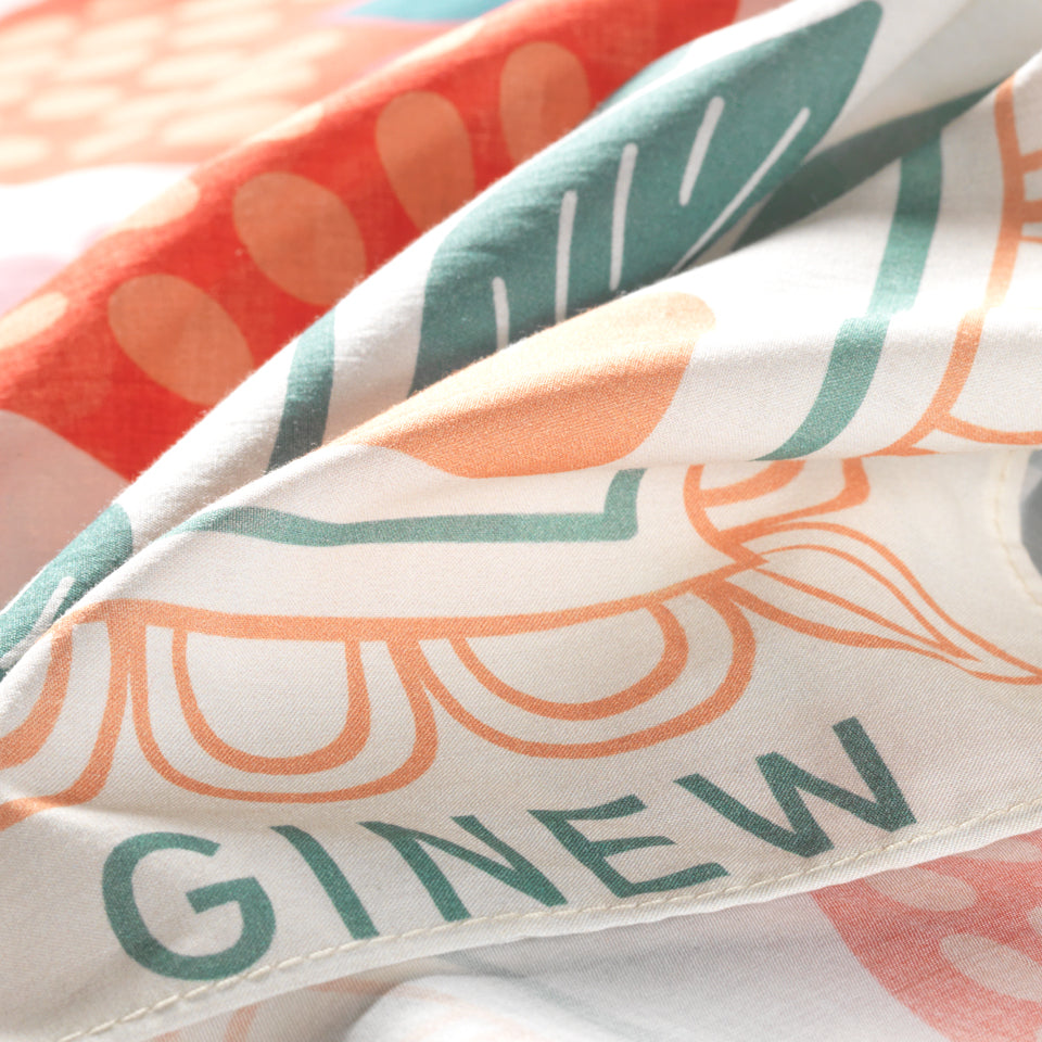 Close up of Ginew on Colorful Oneida strawberry extra large bandana wild rag