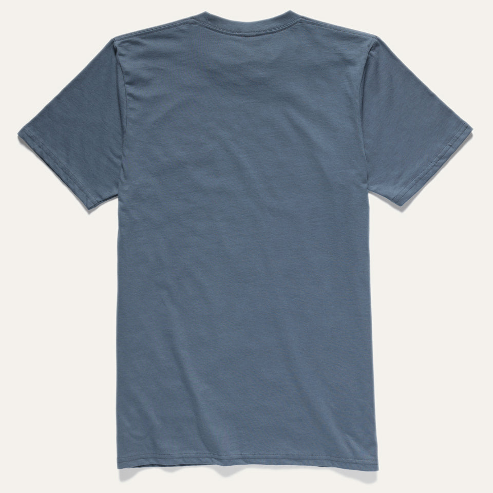 Back view of the organic blue cotton Thunderbird tee. Blue colored tee on a white background