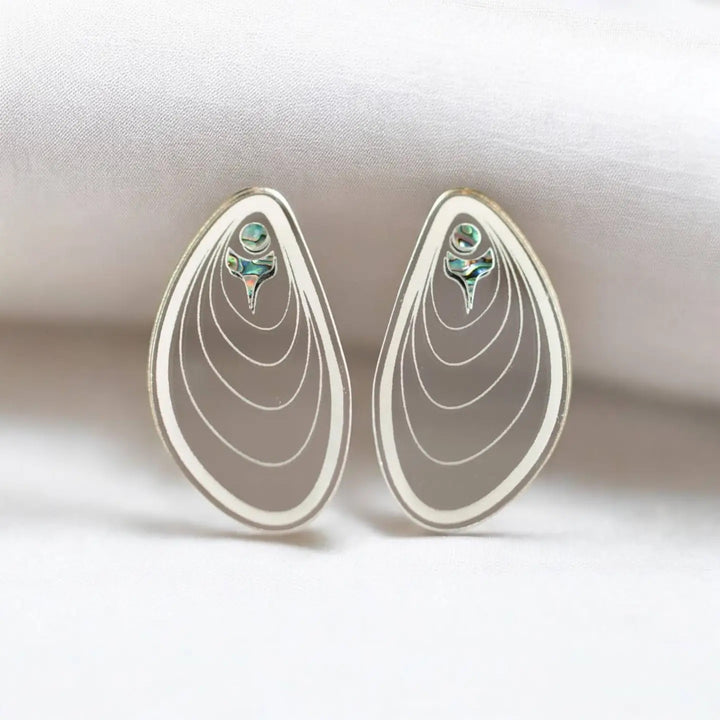 Native American made earrings representing tides white, clear and abalone