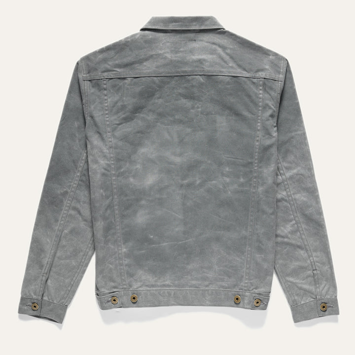 Full back view of Wax Canvas Rider Jacket in Charcoal on neutral background.