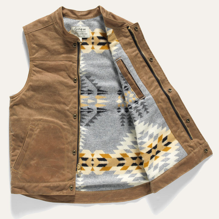 bROWN Wax Canvas Lined Vest by Native American owned Ginew. Lining is grey brown white and black.