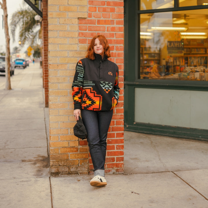 Woman wearing Native Americana popover half zip pullover in fleece and nylon