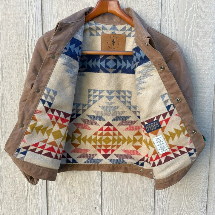 Women's brown wax canvas coat with colorful, southwest Pendleton wool lining with Native American Ginew tag